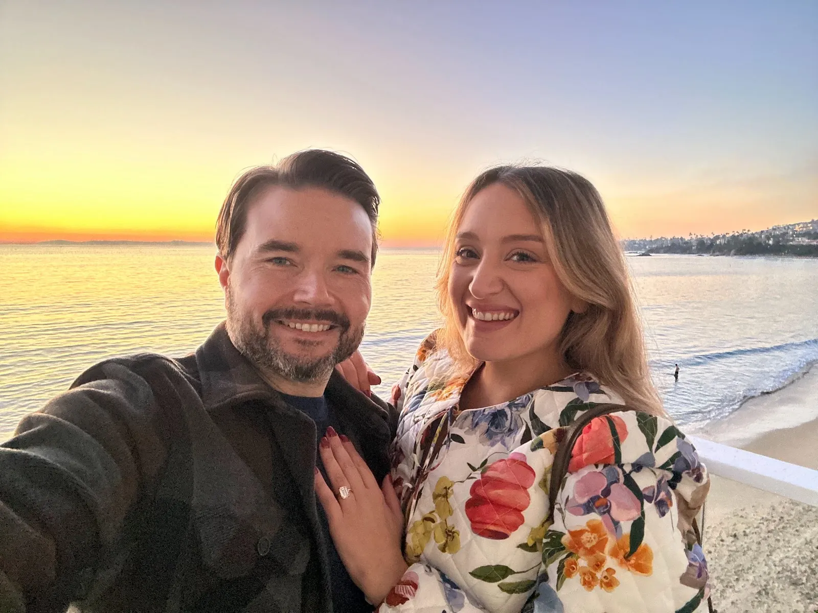 Sarah and Gareth at sunset on the coast, just engaged