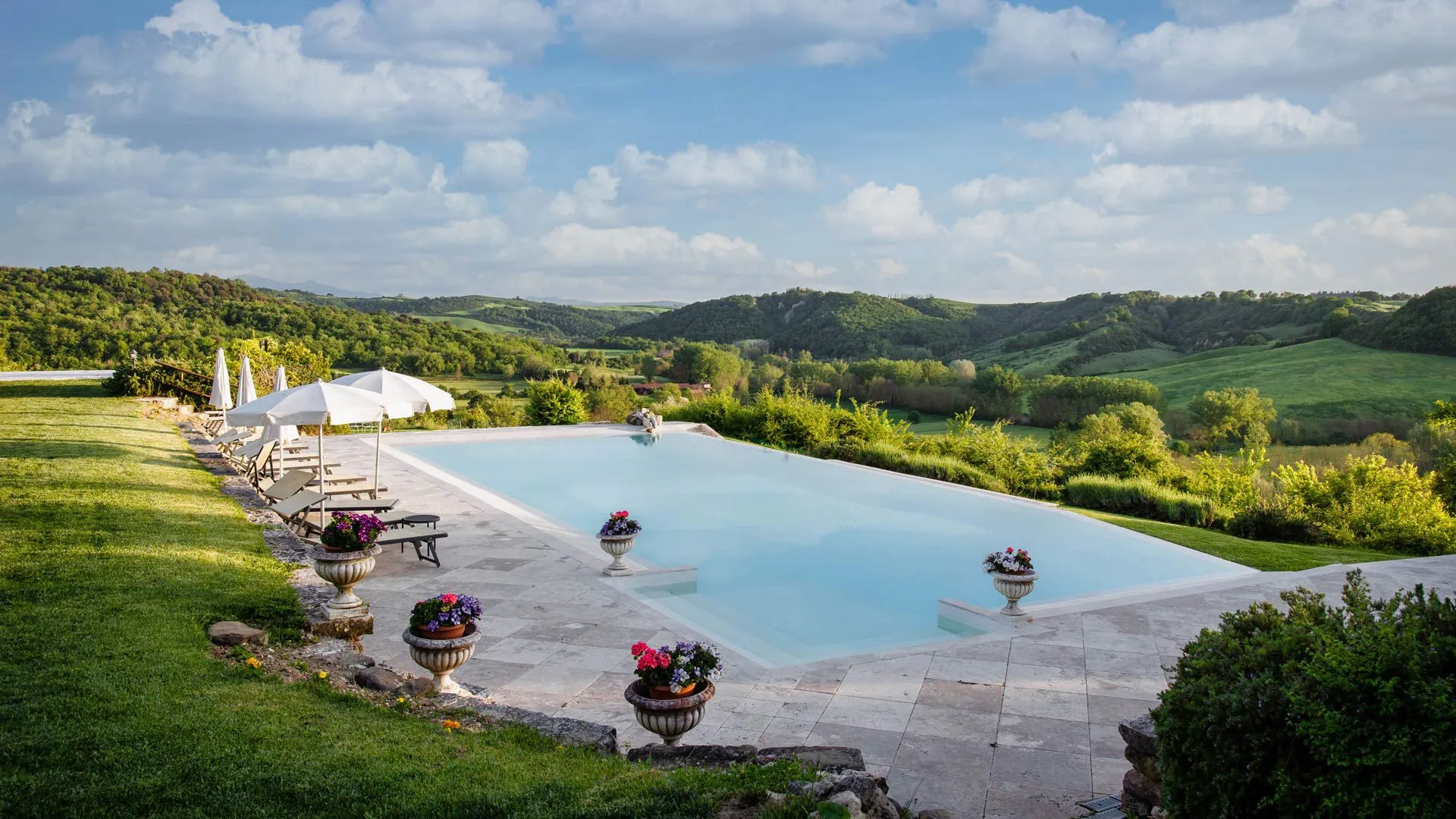 The panoramic infinity pool overlooking the Tuscan hills
